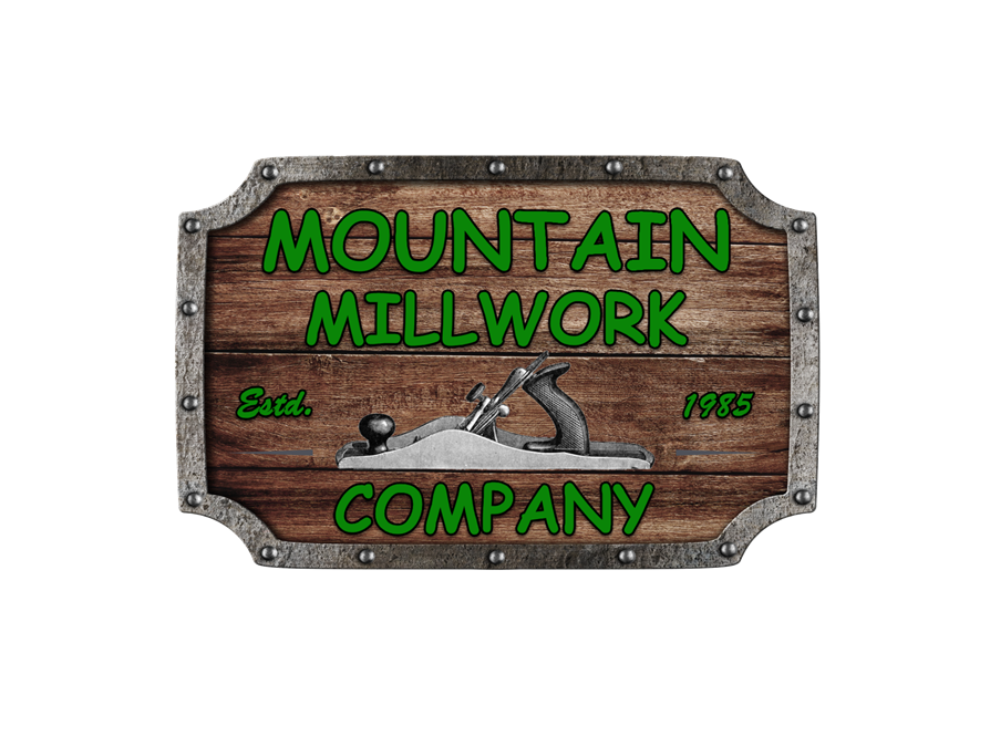 A wooden sign with a plane on it that says mountain millwork company