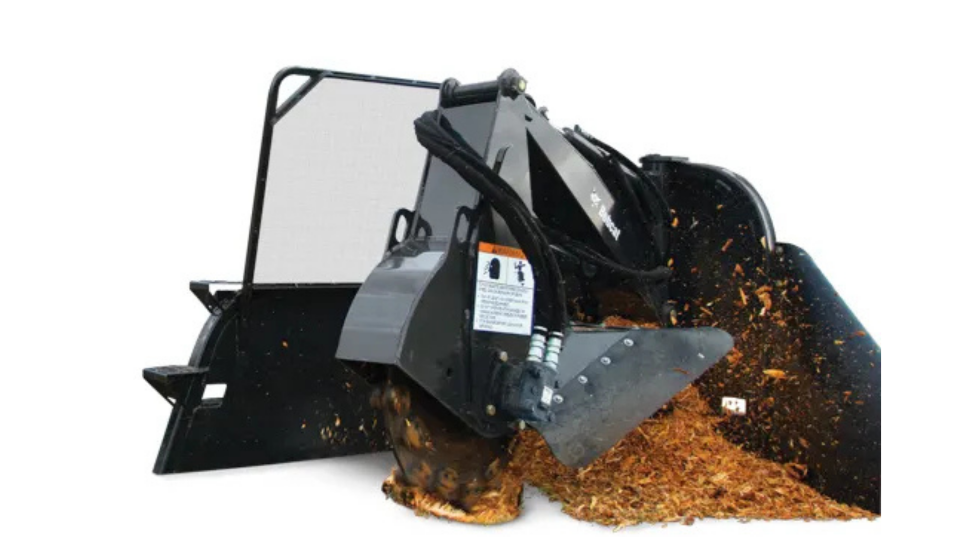 Black skid-steer loader dumping wood chips, with sparks flying from the bucket.