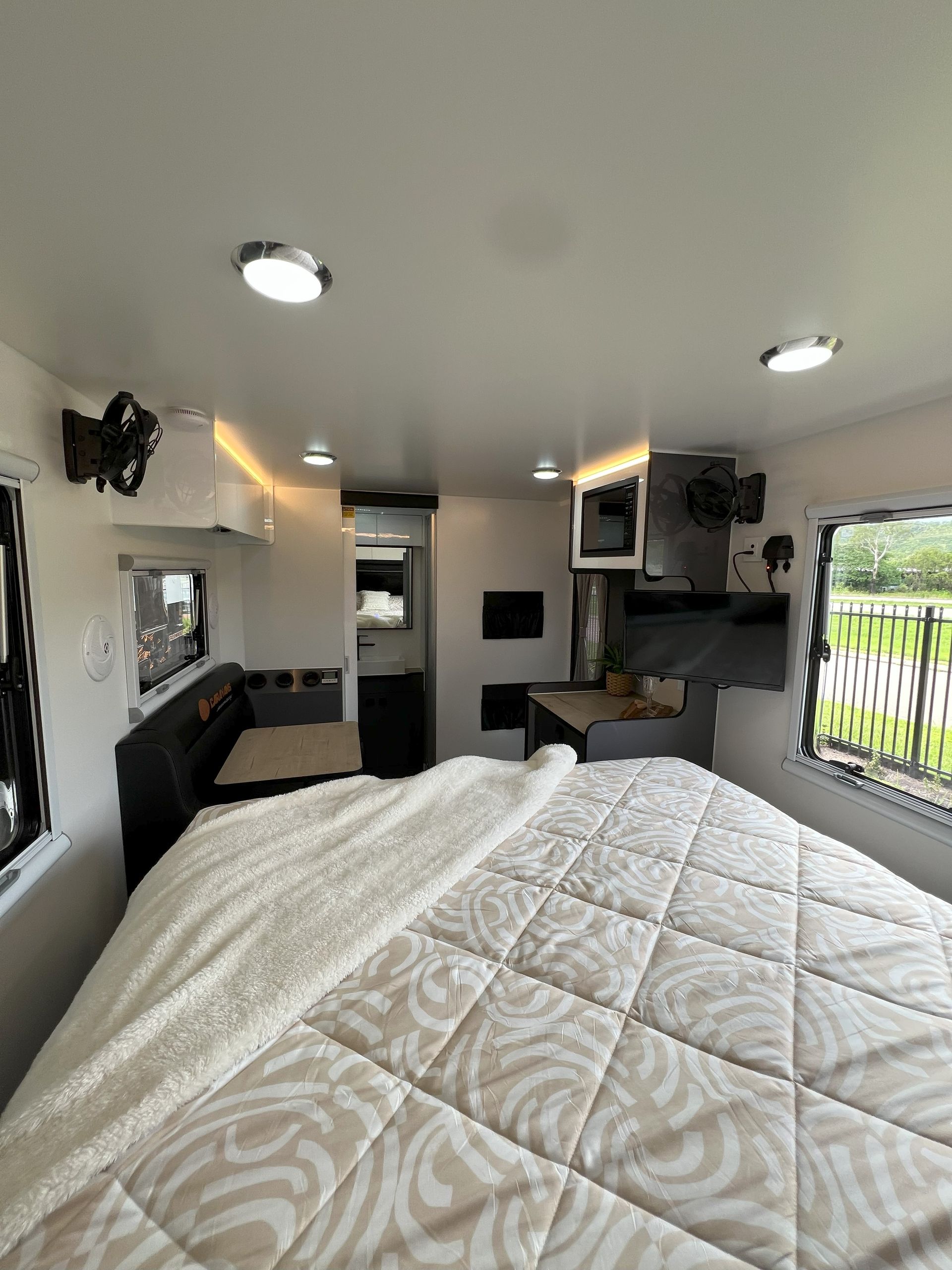 There is a large bed in the middle of the room.