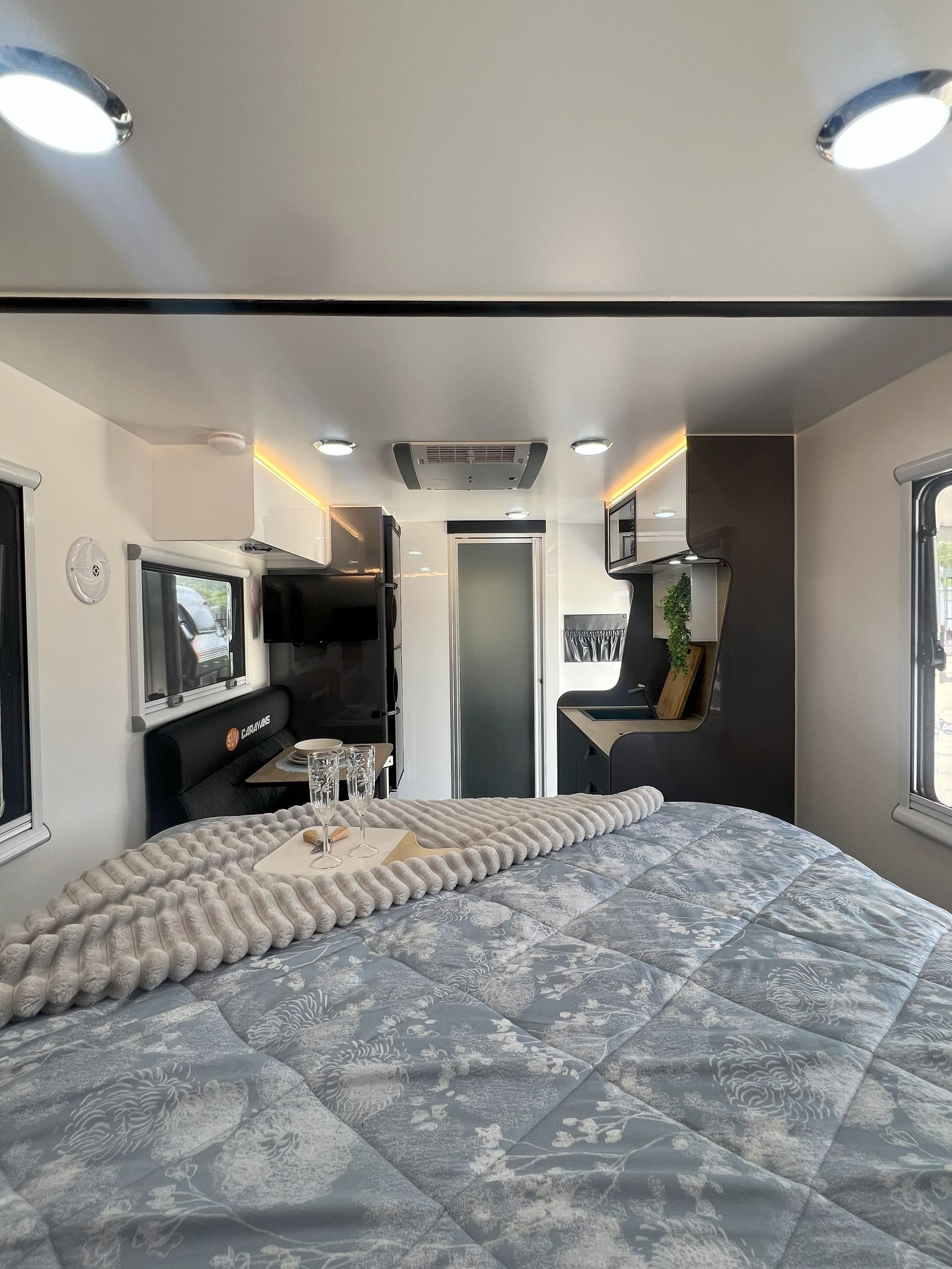 There is a bed in the middle of the room.