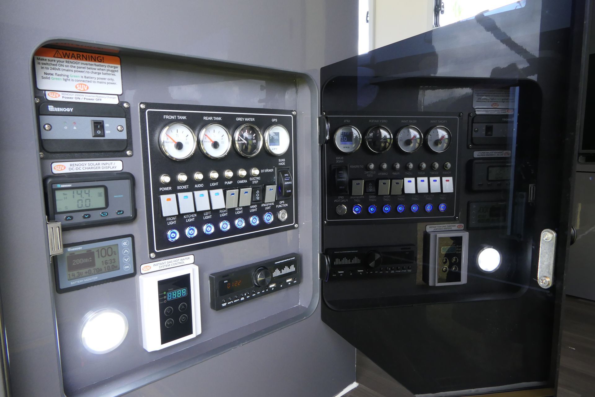 A close up of a control panel on a boat.