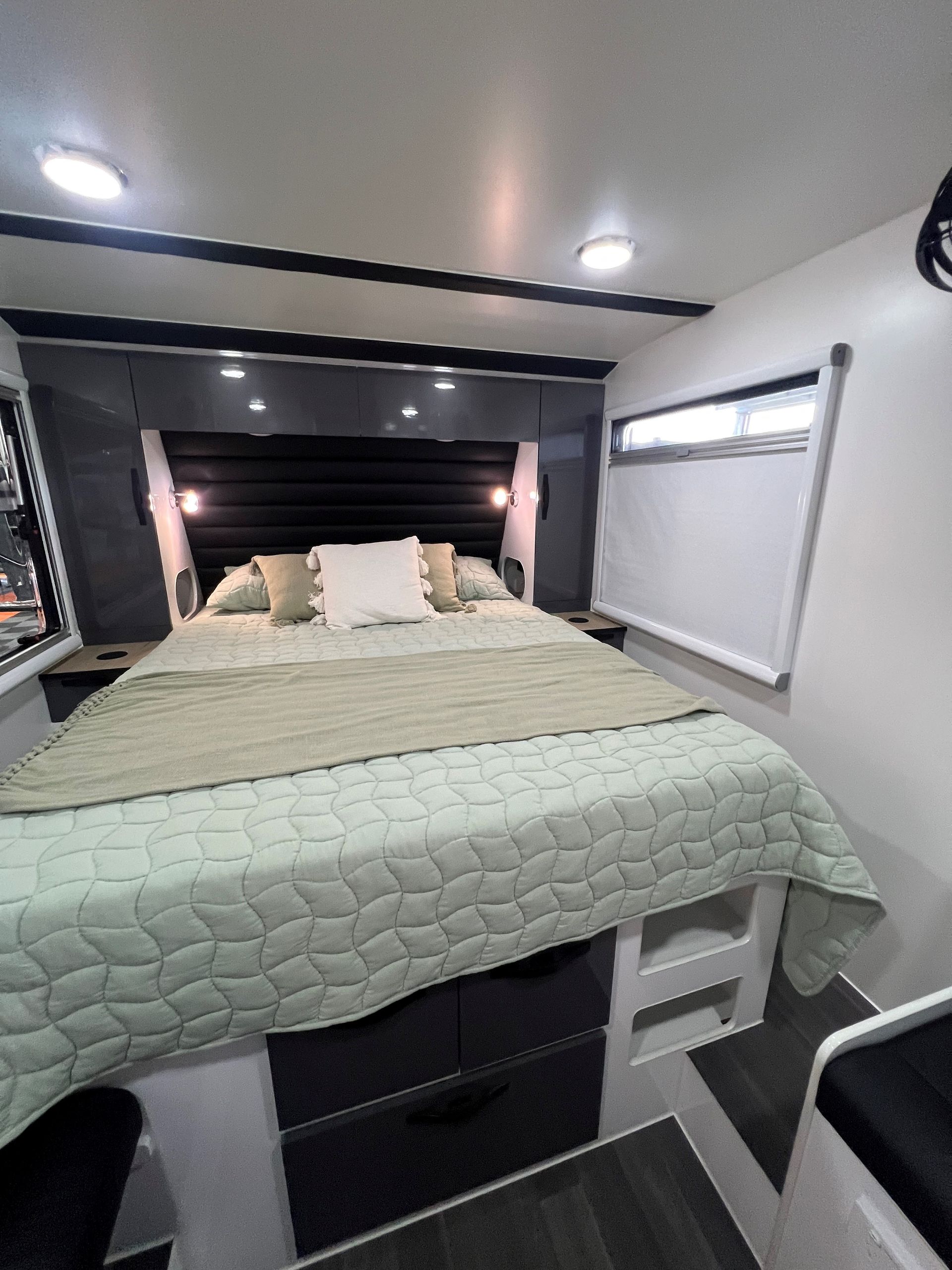 There is a large bed in the middle of the room.