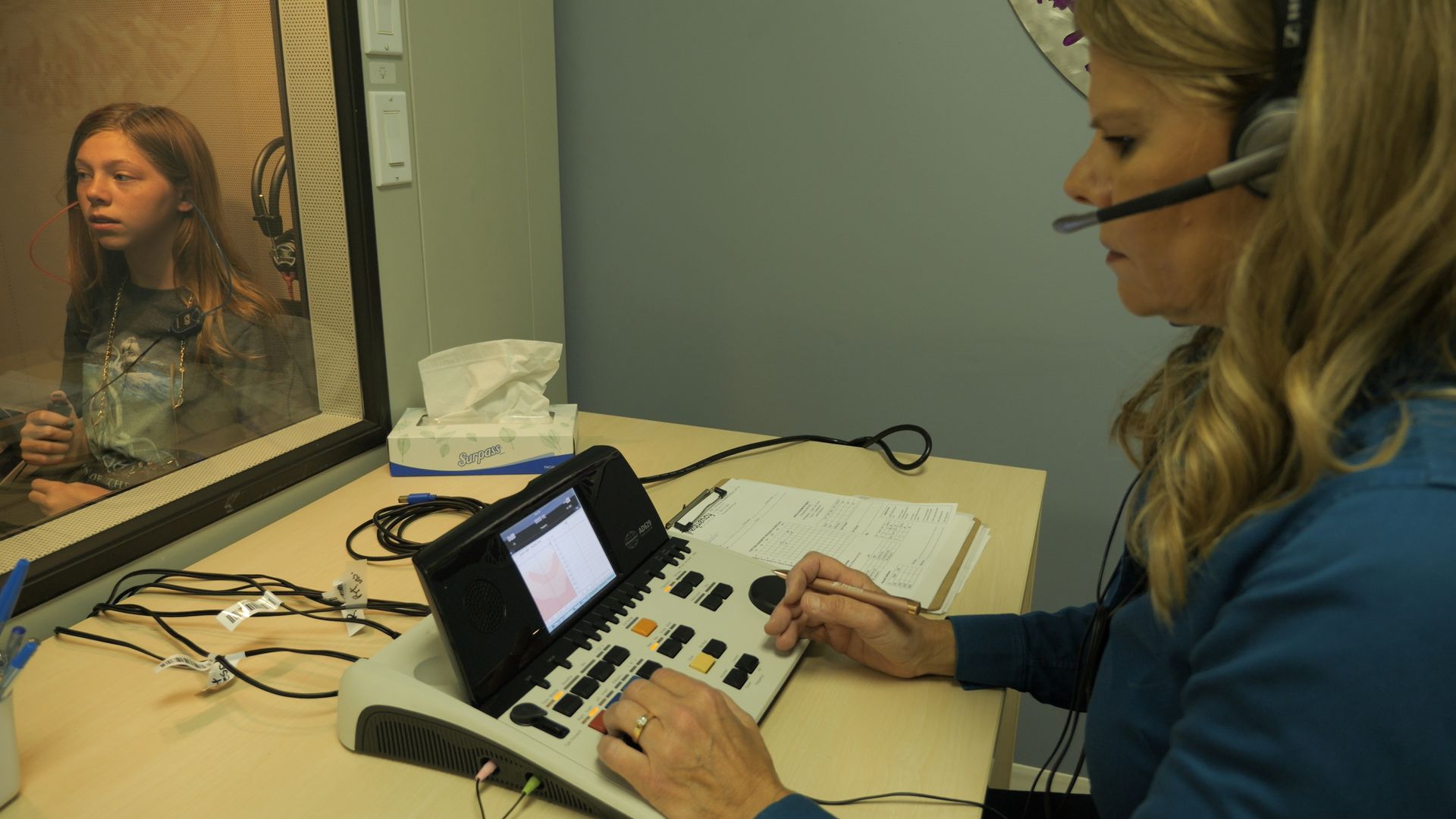 Frequency Hearing providing hearing preventative care through a hearing test for a client from Leduc Alberta