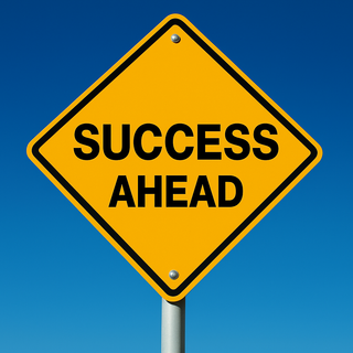 Man looking in rear view mirror