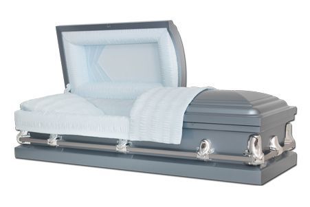 a grey coffin with the lid open and a blue blanket on it