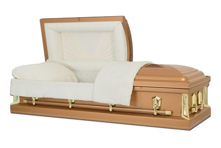 a brown coffin with the lid open and a white blanket on it