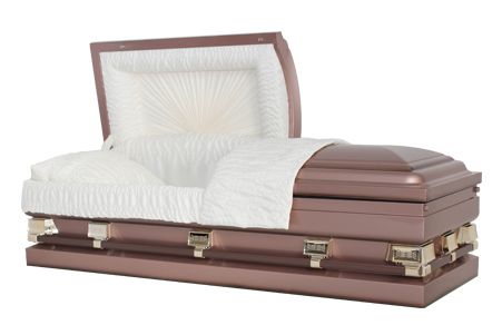 the coffin is open and has a white blanket on it .