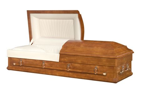 a copper coffin with the lid open and a white blanket on it .
