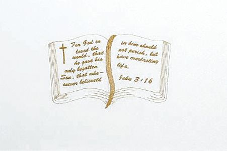 a drawing of an open bible with a cross on it .