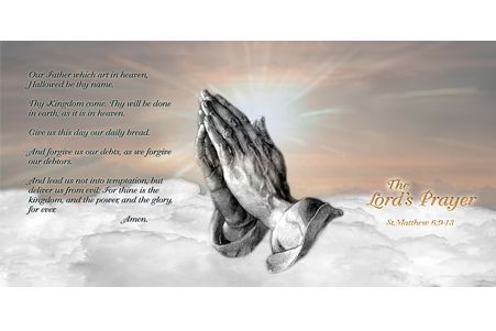 a picture of a person 's hands folded in prayer .