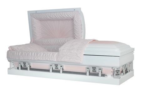 a white coffin with the lid open and a pink blanket on it .