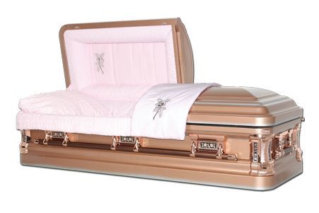 a gold coffin with a pink blanket and a cross on it