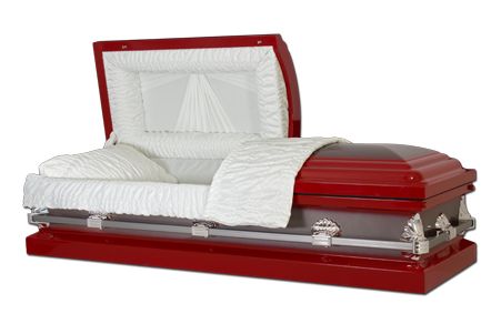 a red coffin with the lid open on a white background .