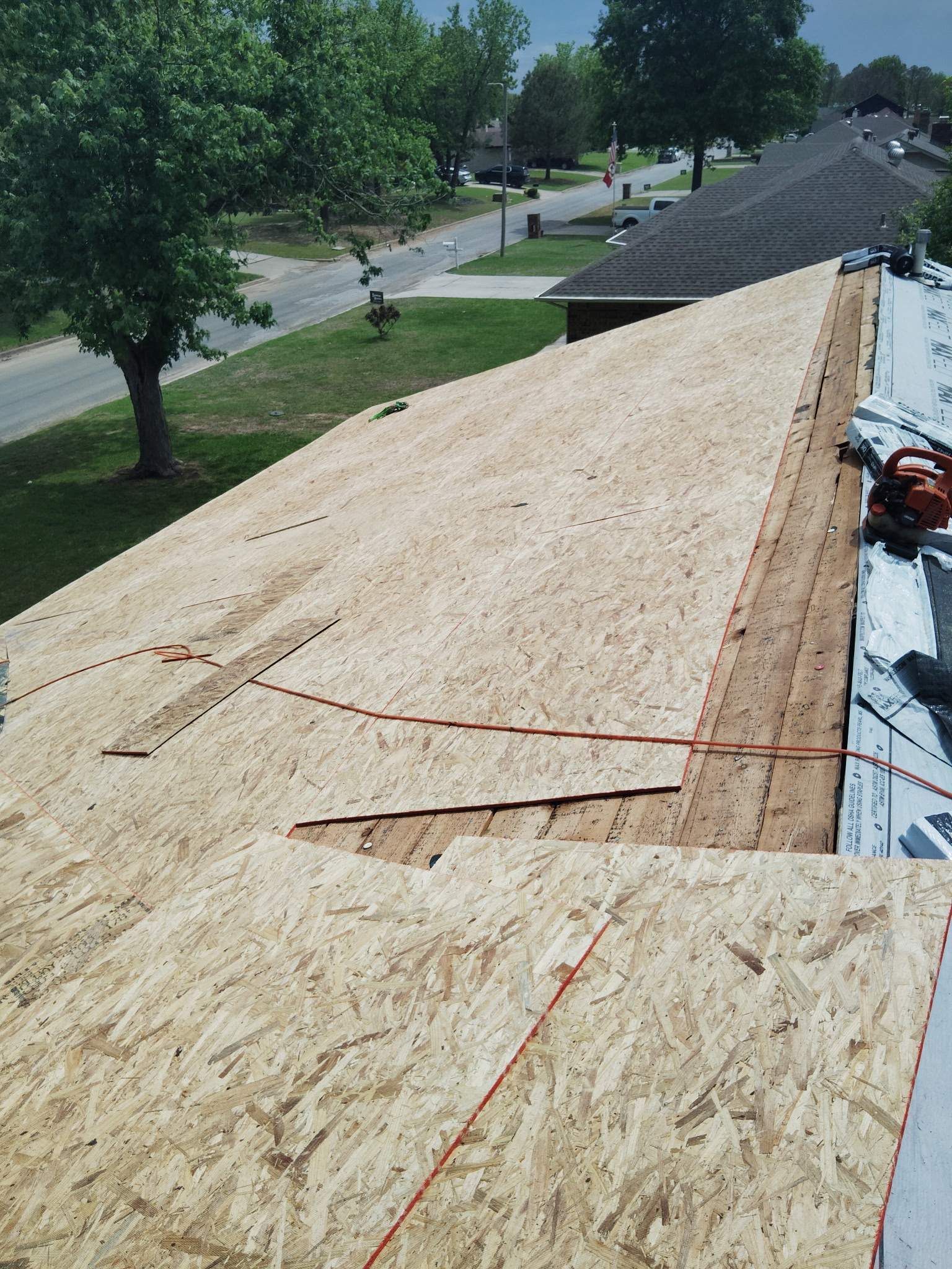 A roof with a lot of plywood on it