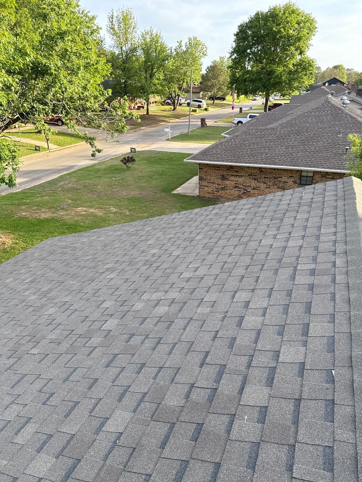 A roof of a house with a lot of shingles on it.
