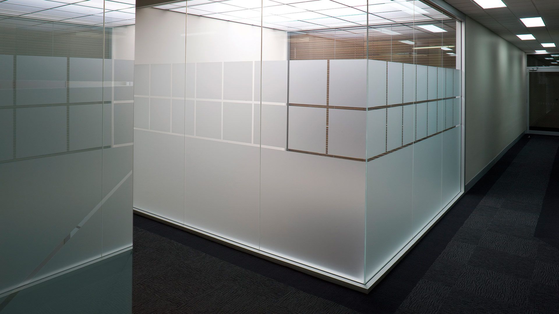 Office interior with frosted glass walls.
