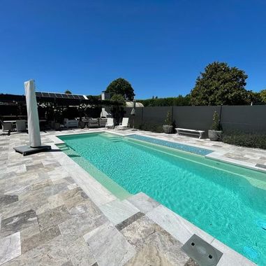 A large swimming pool in the background — Azure Pools Mid North Coast In Taree, NSW