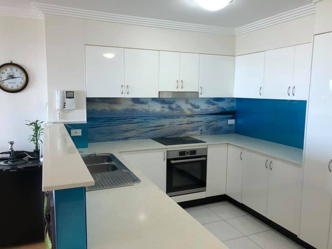 A Kitchen With White Cabinets and Blue Counter Tops — DecoGlaze in Manly, NSW