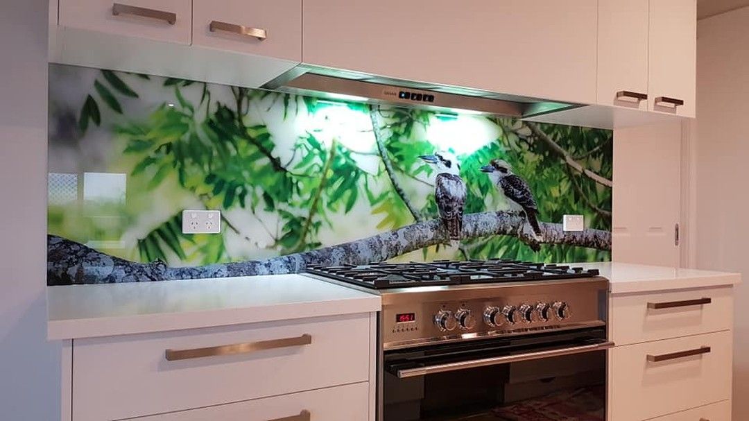 A Kitchen With a Stove and a Painting of a Bird on the Backsplash — DecoGlaze in Randwick, NSW