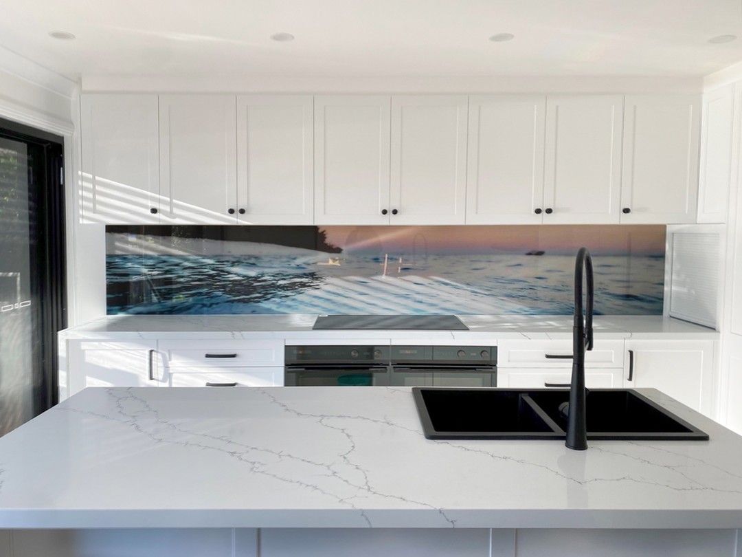 A Kitchen With White Cabinets , a Sink , and a Stainless Steel Appliance — DecoGlaze in Bellevue Hill, NSW
