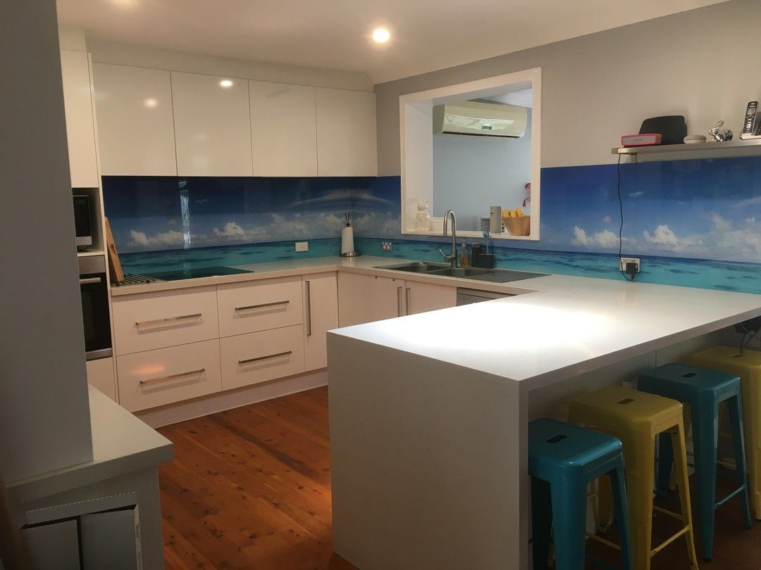 A Kitchen With a Large Island and Stools — DecoGlaze in Drummoyne, NSW
