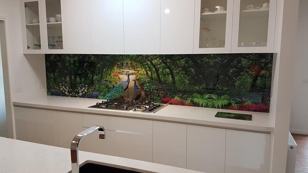 A Kitchen With White Cabinets , a Sink and a Stove Top Oven — DecoGlaze in Manly, NSW