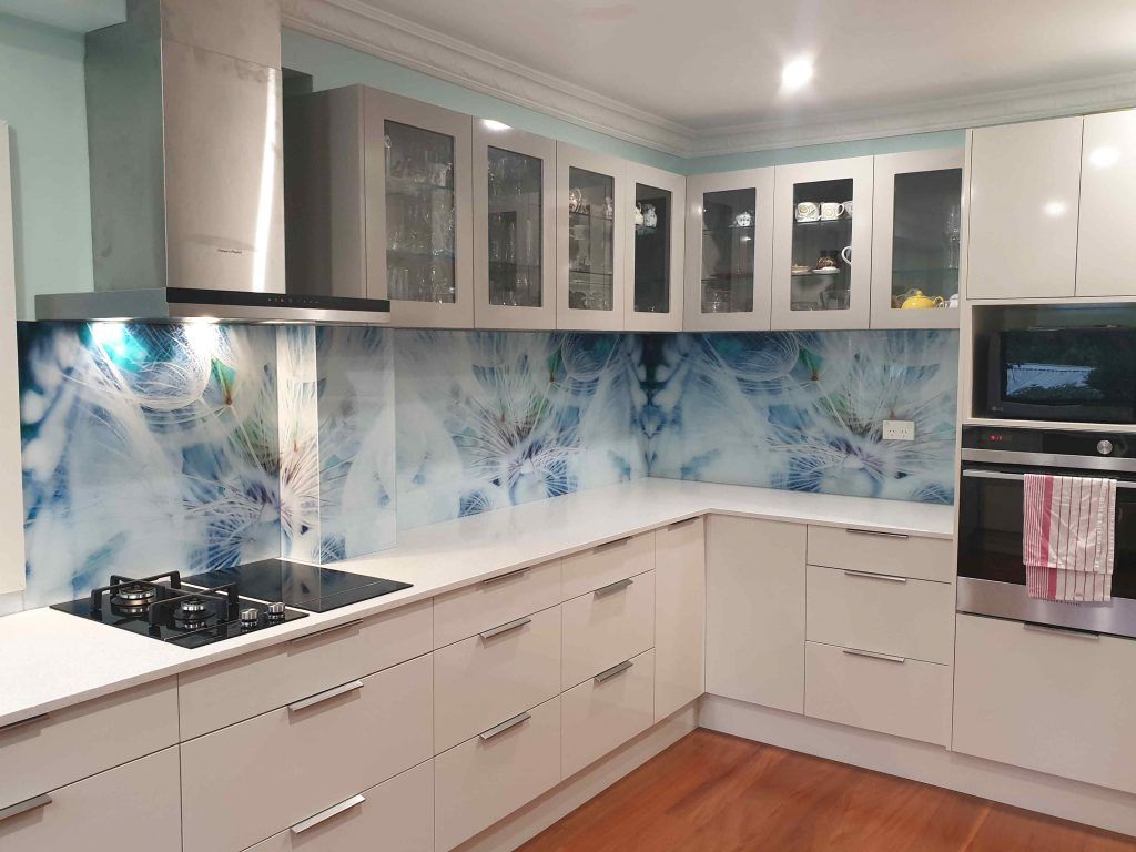 A Kitchen With White Cabinets and a Stove Top Oven — DecoGlaze in Windsor, NSW