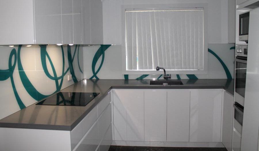 A Kitchen With White Cabinets and Stainless Steel Appliances — DecoGlaze in Windsor, NSW