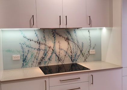 A Kitchen With White Cabinets and a Stove Top Oven — DecoGlaze in Penrith, NSW