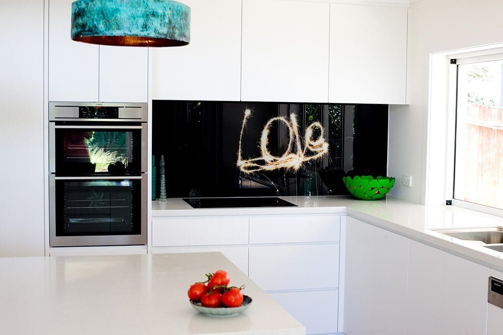 A Kitchen With a Bowl of Tomatoes on the Counter — DecoGlaze in Camden, NSW