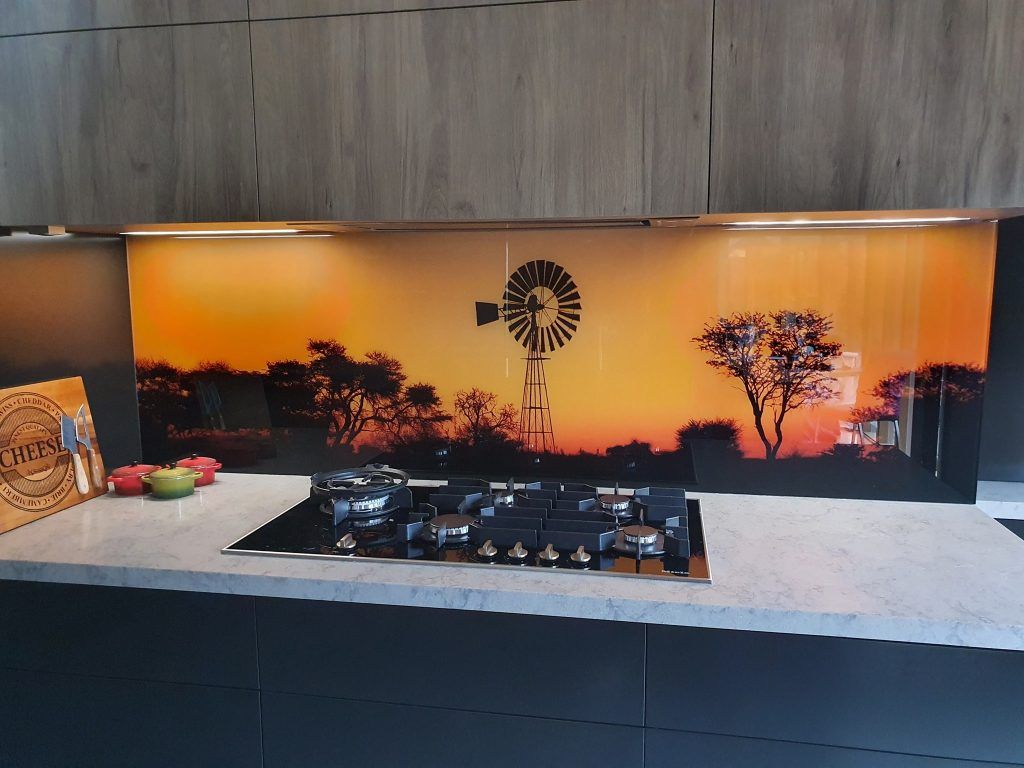 A Kitchen With a Stove Top Oven and a Picture of a Windmill — DecoGlaze in Minchinbury, NSW