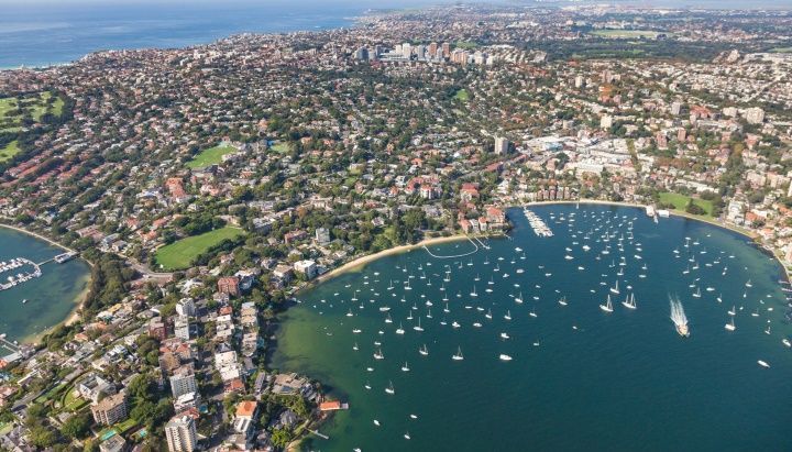 An Aerial View of a Large Body of Water Surrounded by a City — DecoGlaze in Bellevue Hill, NSW