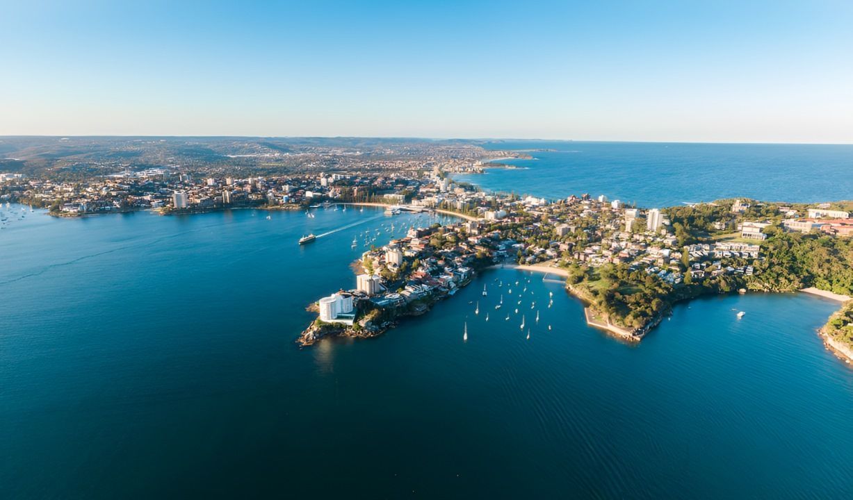 An Aerial View of a Large Body of Water With a City in the Background — DecoGlaze in Manly, NSW
