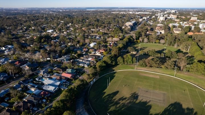 An Aerial View of a Residential Area With a Soccer Field in the Middle — DecoGlaze in Sutherland, NSW