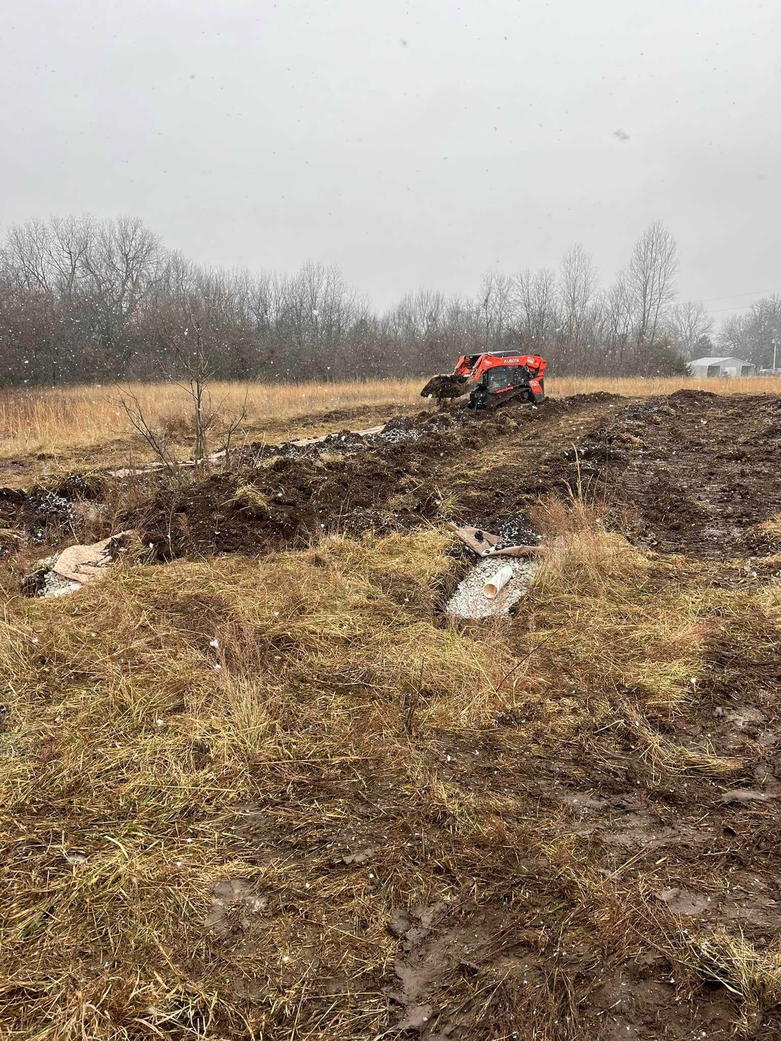 A bathroom with a bathtub and a skylight in the ceiling