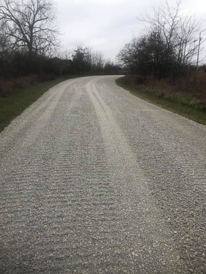 A man is working on a kitchen in a house under construction