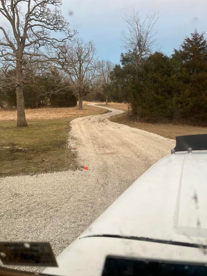 A building under construction with a red roof