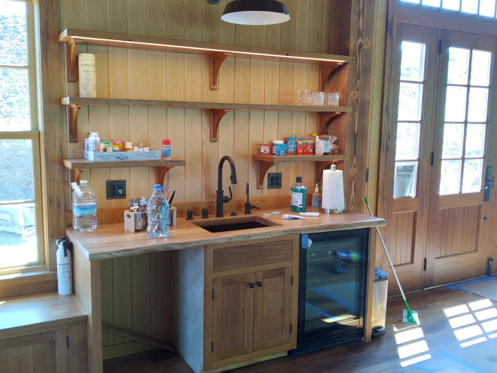 A Kitchen with A Sink, A Refrigerator, and Shelves | Narvon, PA | JDH Custom Millwork