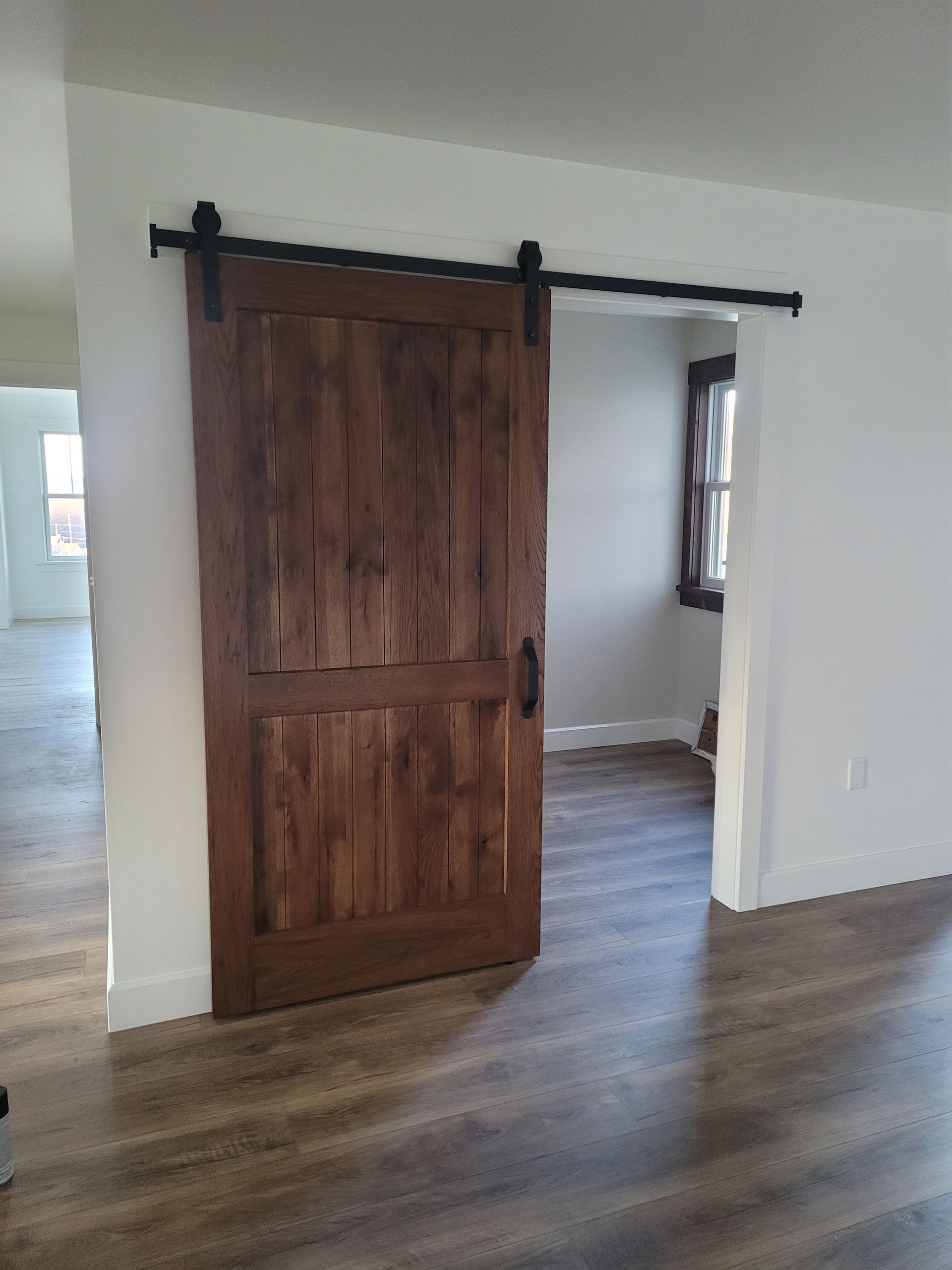 There Is a Sliding Barn Door in The Middle of A Room | Narvon, PA | JDH Custom Millwork