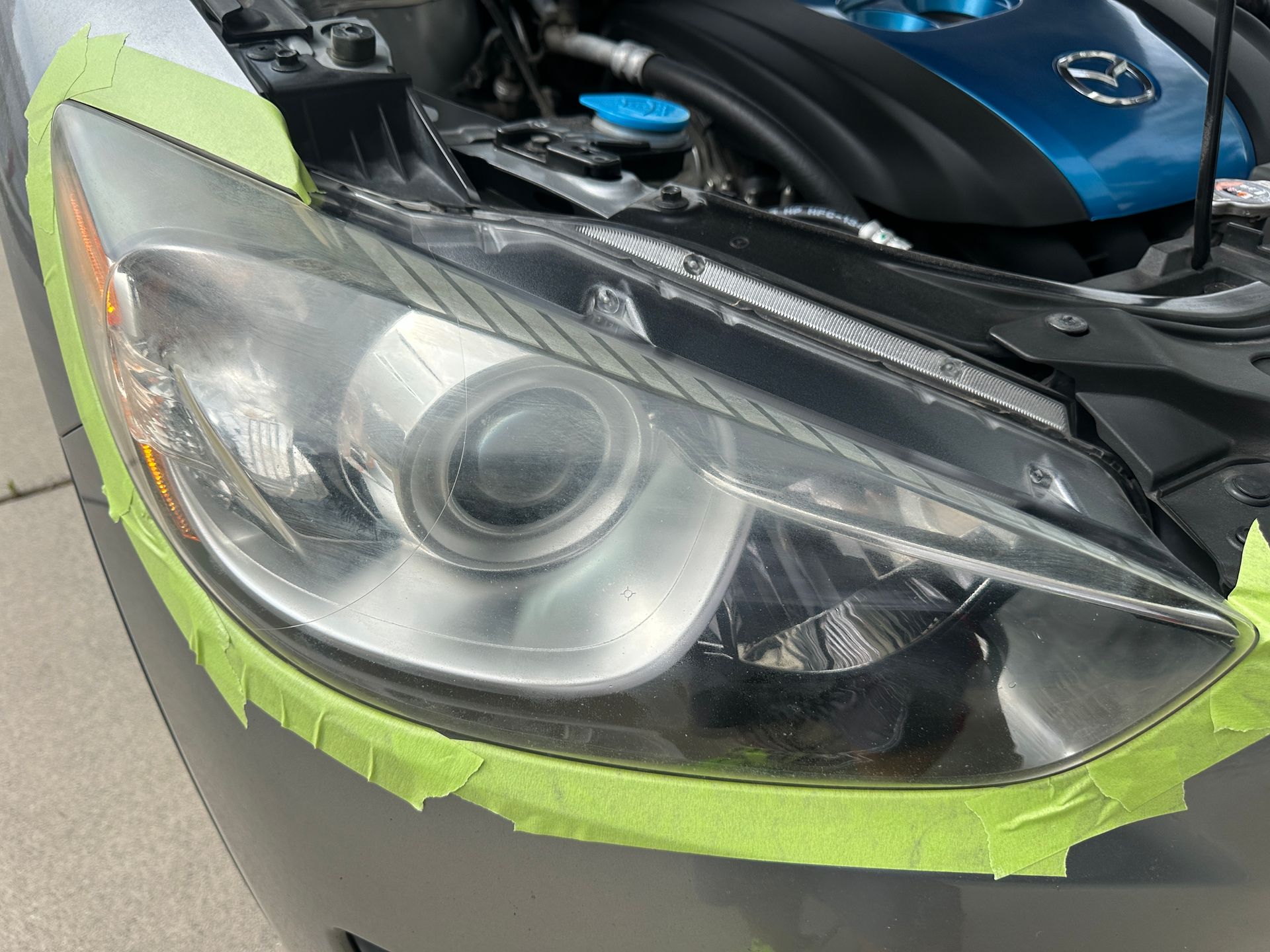 2014 Mazda CX-5 headlight restoration, before pic