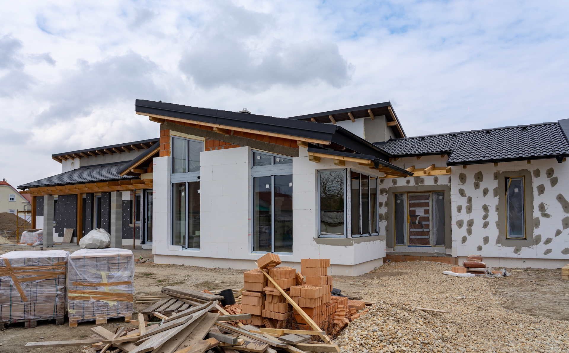 A large house is being built in a rural area.