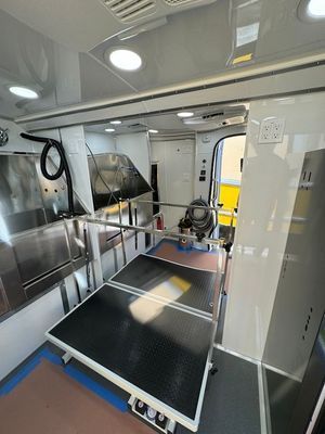 There is a table in the middle of the room.