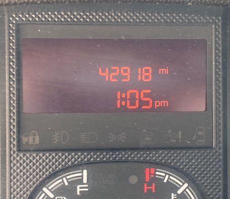 A digital display shows the time as 1:05 pm