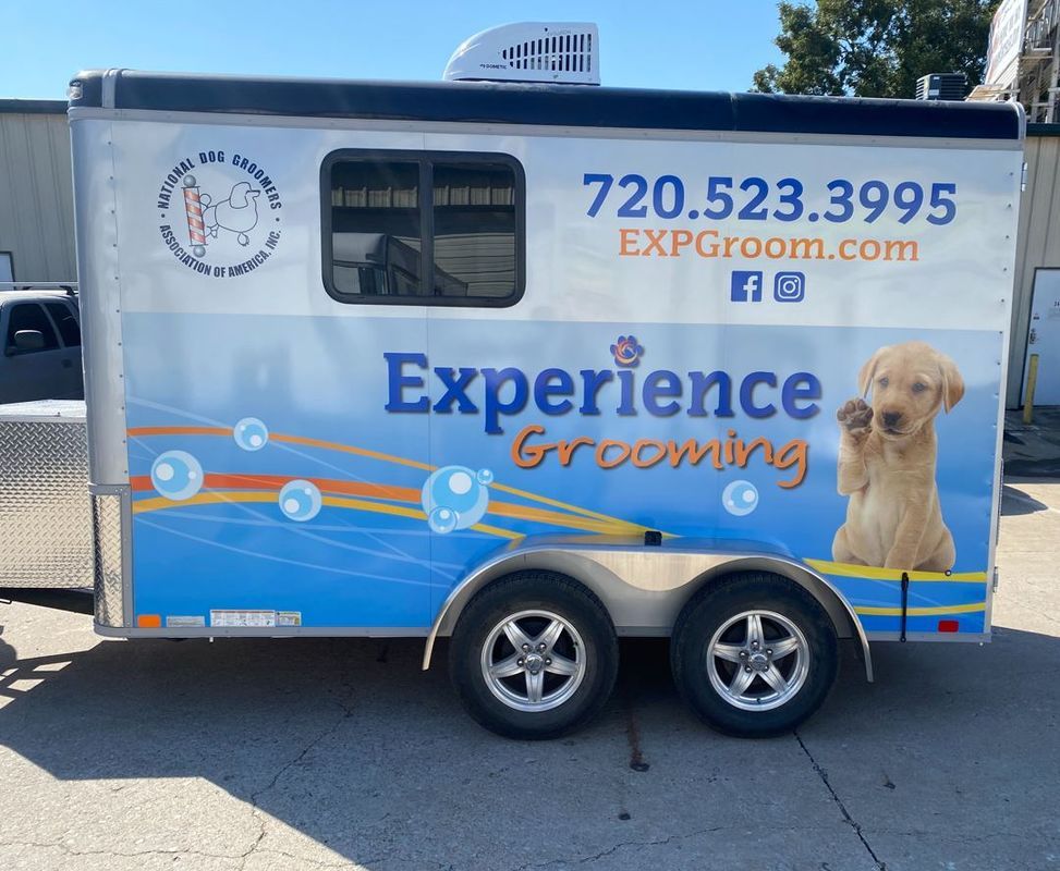 A trailer that says experience grooming on it