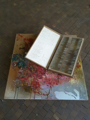 Silent salesman artwork, table top and box containing slides of the human body