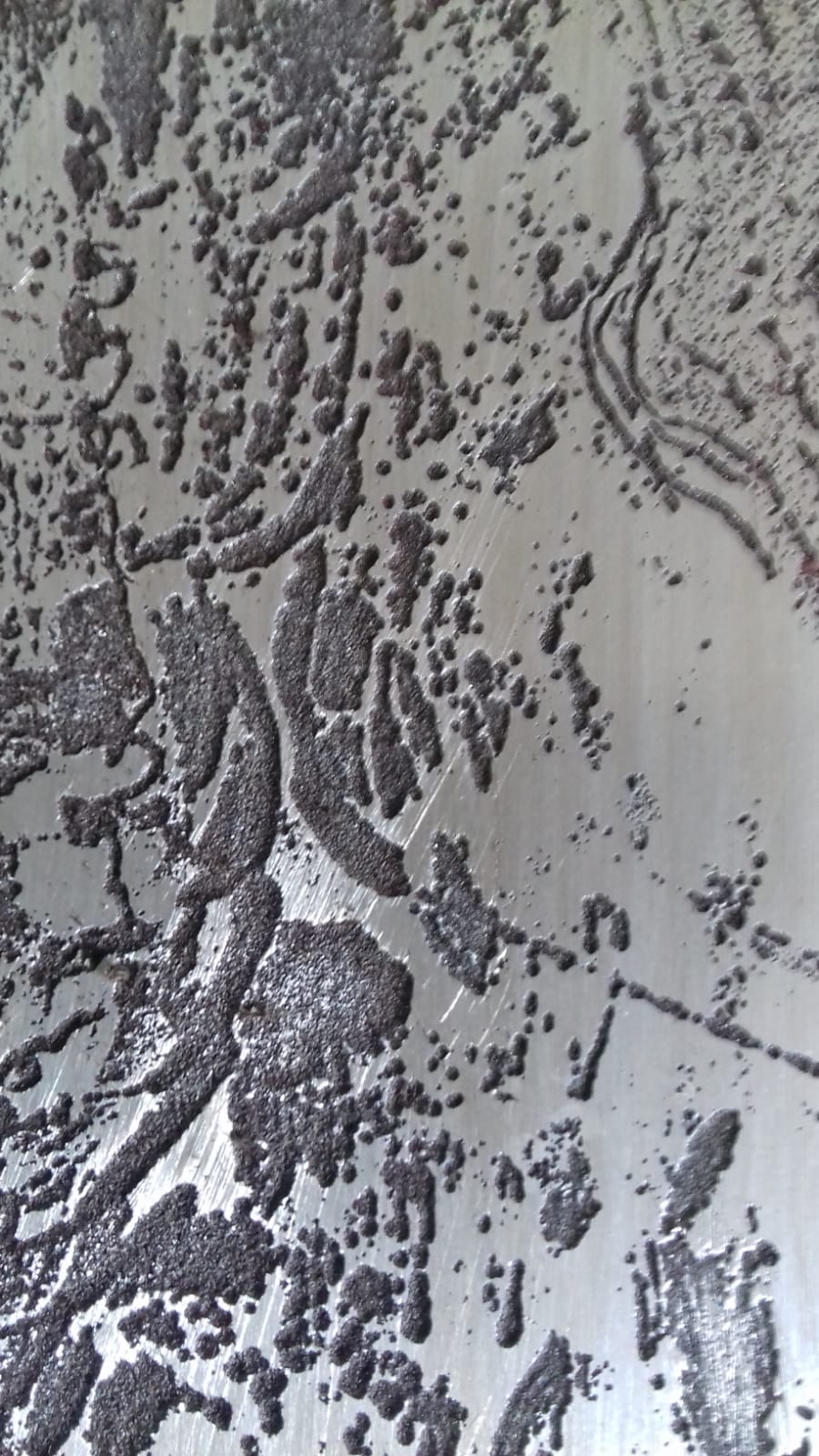 Etched aluminium plate with river bed marks