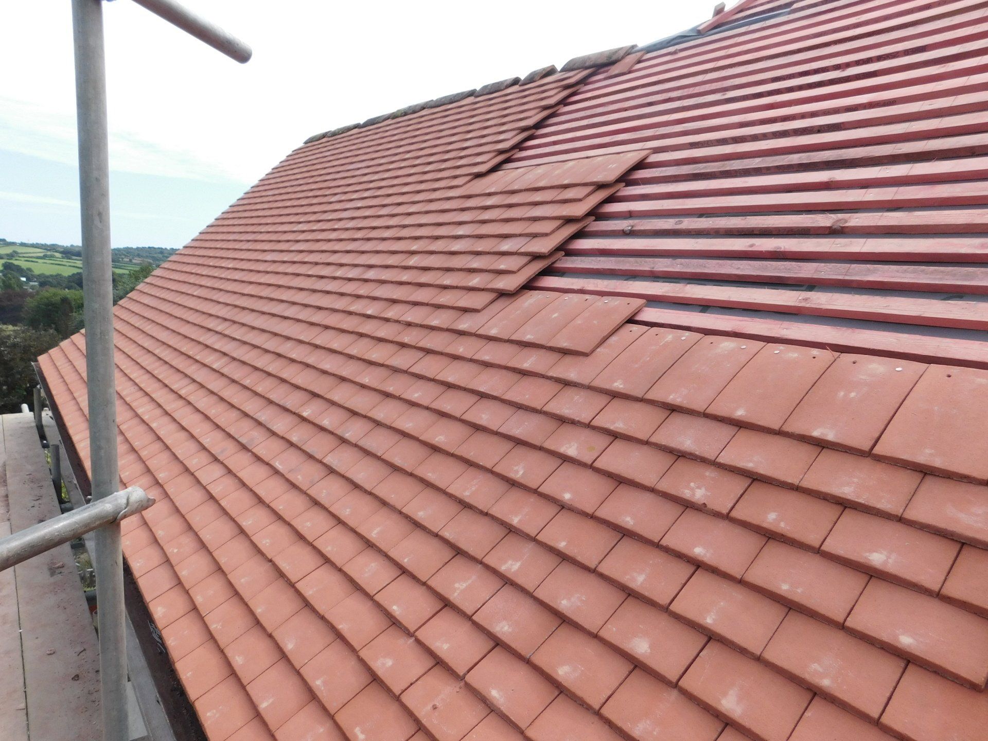 clay plain tiles, reroofing tiles, tile roof, cornwall roofing, M.A.R. Roofing, red tiles