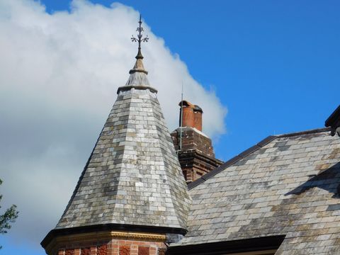 re-slating of a tower, Mitred hips, slate roof, lead