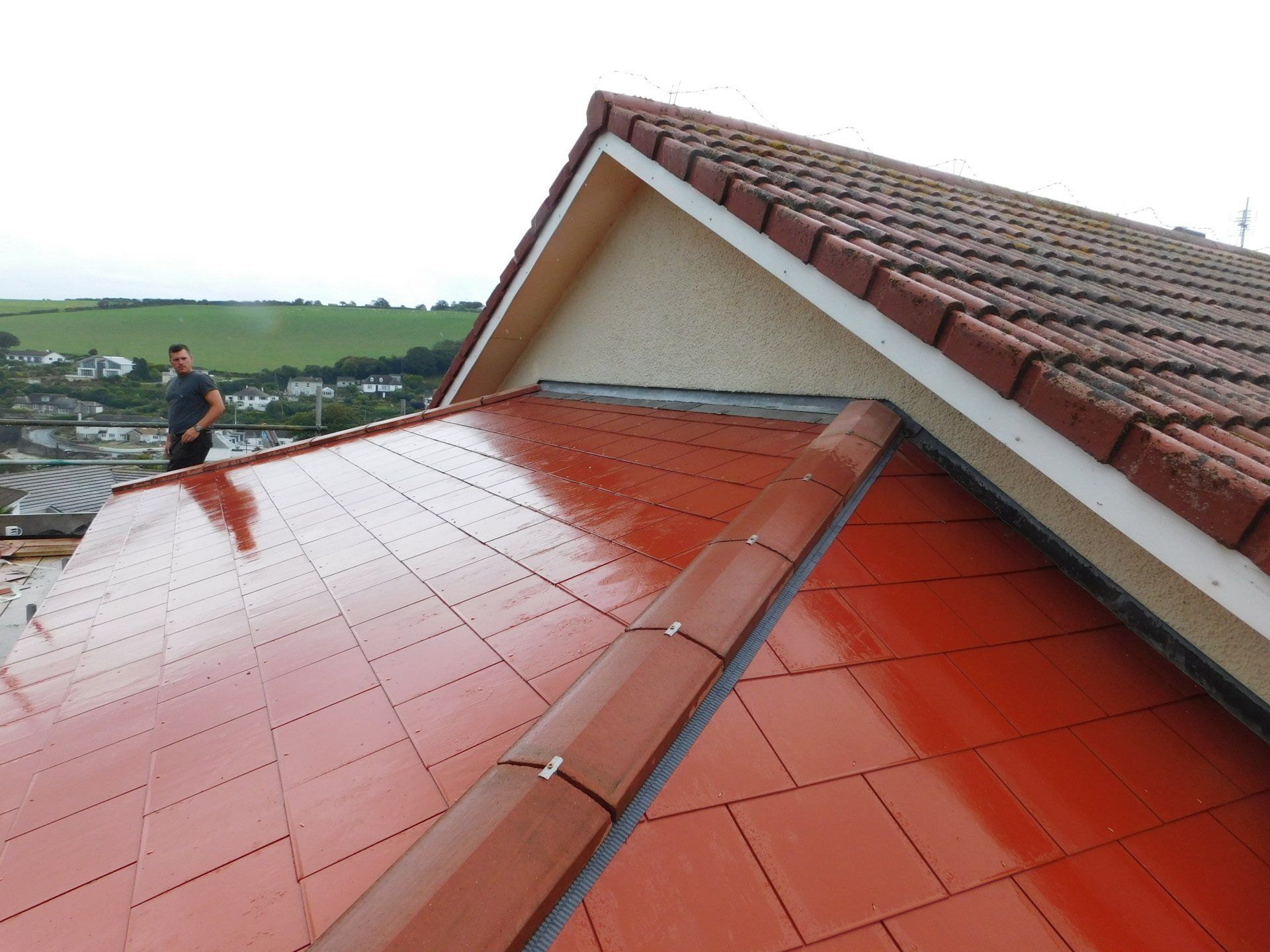 red fibre cement, reroof extension, red ridge, red tiles, dry fix hips, st.austell, low pitch roof, M.A.R. Roofing