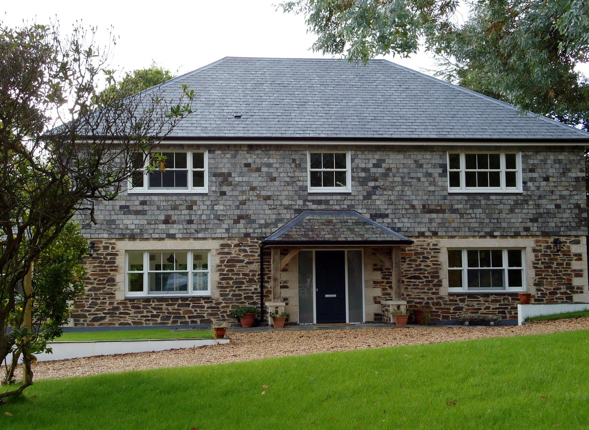 New Dwelling Truro reroof, reclaimed slate vertical roofing, roofers cornwall, MAR roofing, slate roof, grey ridge